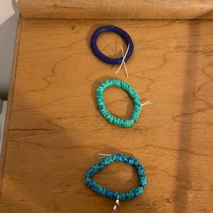 Set of teal and purple bracelets with sliver owl charm